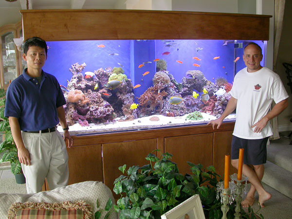 Lewis (on the right) and I standing in front of his tank in order to show its awesome panoramic scale.